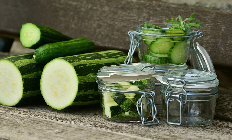 cucumber sitting in glass jars zucchini vs cucumber